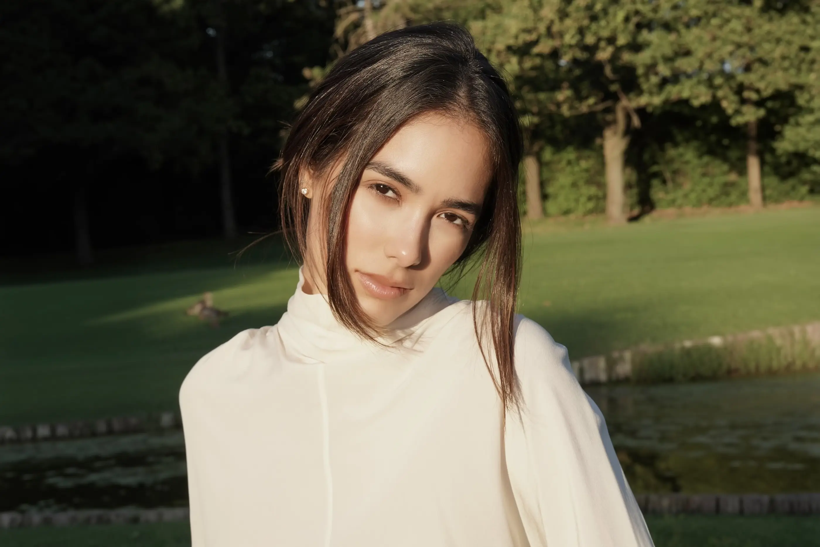 Sharon Fonseca in a sunlit garden