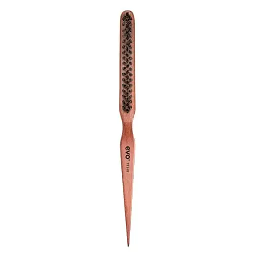 evo Tyler teasing brush with dark bristles and a long pointed handle in a natural wood tone.