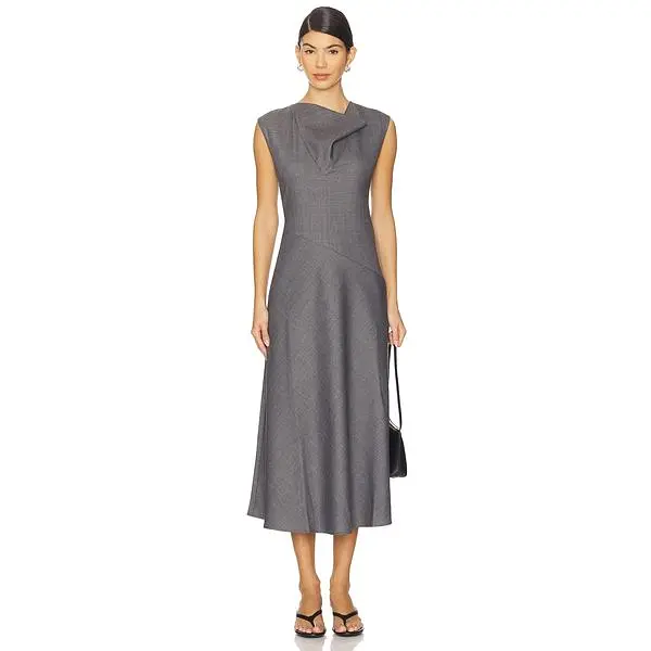 Model wearing the grey Rue Sophie Kole midi dress with a flared skirt.